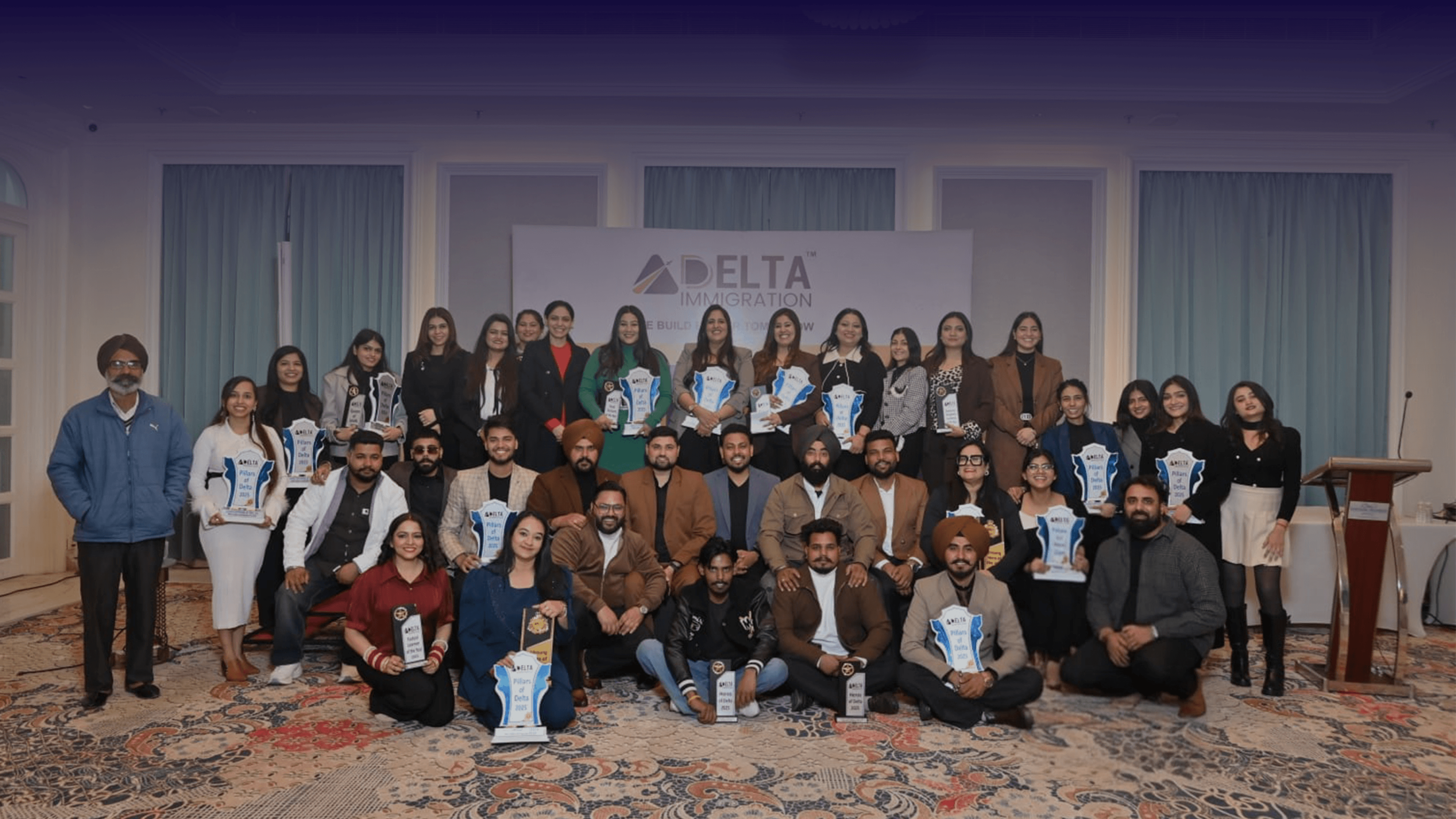 Portrait of the Delta Immigration Team members
